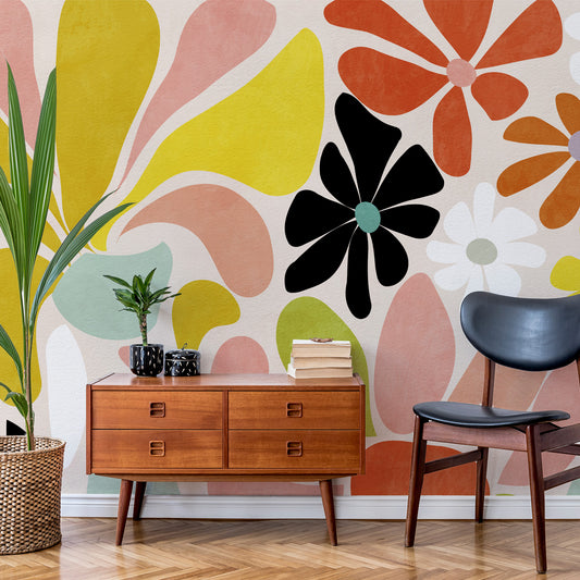 Retro floral wallpaper featuring a watercolour texture in bright colours from wallpapermural.com in a living room interior scene