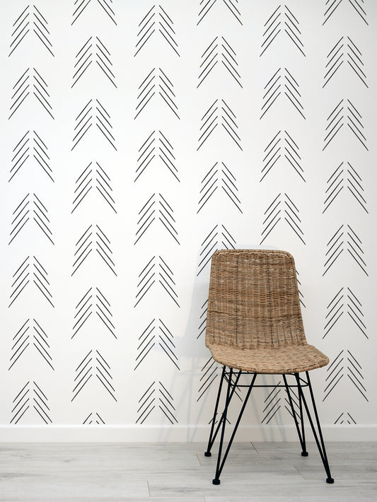 Furutre Minimal Black & White Scandi Tree Pattern Wallpaper with a Rattan Chair