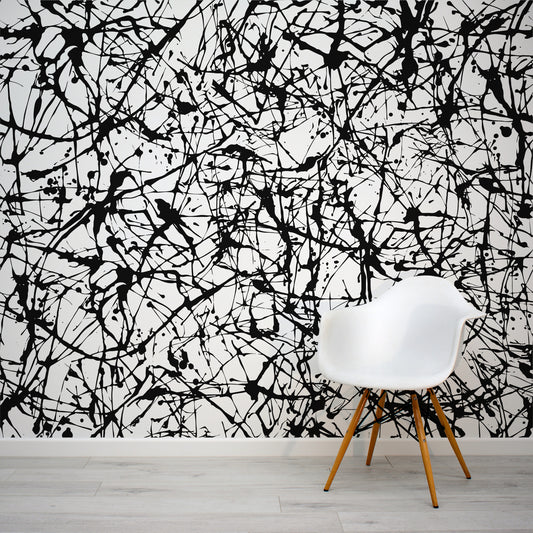 Speckle wallpaper mural with a White chair in front | WallpaperMural.com