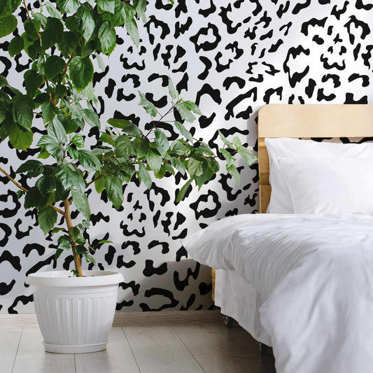 Cifiess wallpaper mural in a bedroom with a Green plant | WallpaperMural.com